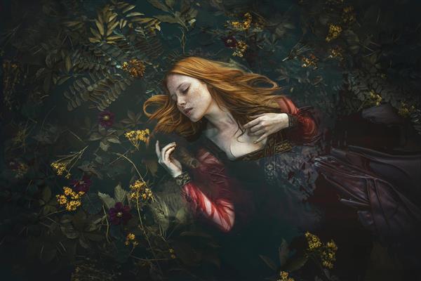 زن جوان مو قرمز خوابیده در میان گل ها