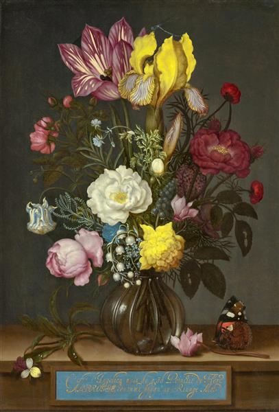 دسته گل در یک گلدان شیشه ای