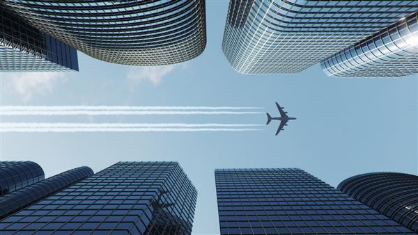 پرواز هواپیما بر فراز مرکز تجاری آسمان خراش ها نمای پایین آسمان‌خراش‌ها با هواپیمای پرنده در یک روز آفتابی روشن منطقه تجاری