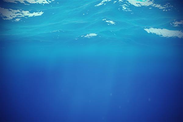 پس زمینه آبی زیر آب در اقیانوس دریا با تصویر سه بعدی نور حجمی