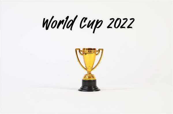 جام طلایی با متن جام جهانی 2022 در پس زمینه سفید