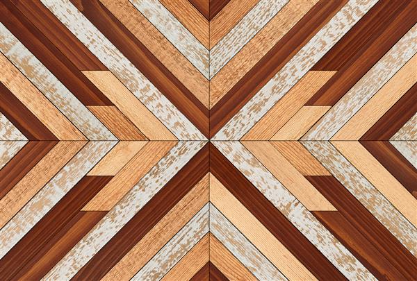 دیوار چوبی رنگارنگ با الگوی شورون ساخته شده از تخته های چوب سخت باریک پس زمینه بافت چوب