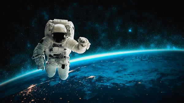 فضانورد فضانورد در حین کار برای ایستگاه فضایی در فضای بیرونی پیاده روی فضایی انجام می دهد فضانورد برای عملیات فضایی لباس فضایی کامل می پوشد عناصر این تصویر توسط عکس های فضانورد فضایی ناسا ارائه شده است
