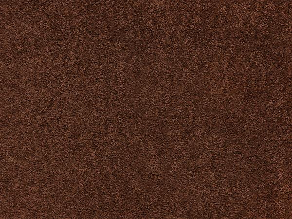 نمای نزدیک از یک کف فرش با بافتی ملایم رنگ قهوه ای