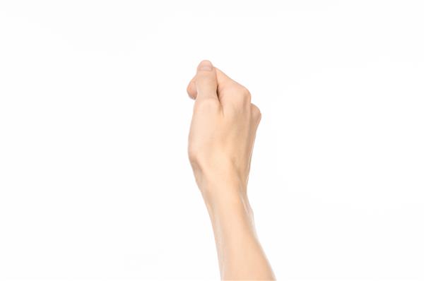 موضوع حرکات حرکات دست انسان که نمای اول شخص جدا شده روی پس‌زمینه سفید در استودیو را نشان می‌دهد