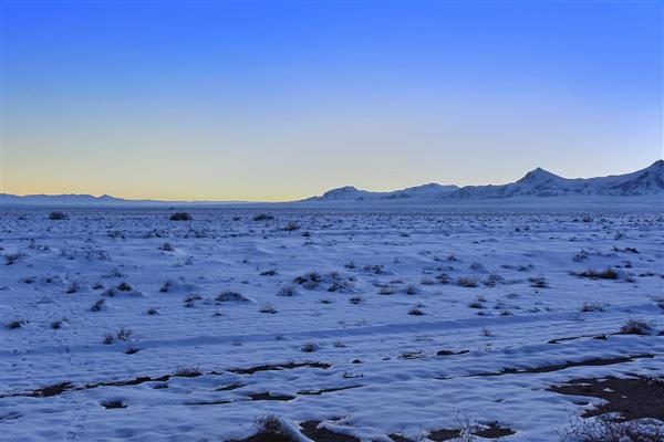 منظره یک غروب زمستانی در بیابان