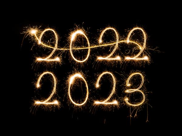 سال نو مبارک 2023 متن درخشان درخشان سال نو مبارک 2023 جدا شده در پس زمینه سیاه زیبا