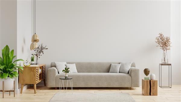 اتاق نشیمن خالی با مبل دارای گیاهان و میز روی پس زمینه دیوار سفید خالی است رندر سه بعدی