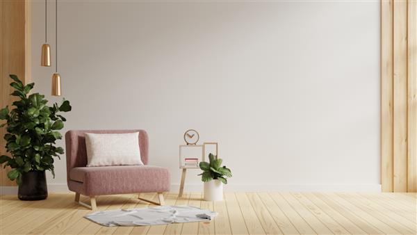 فضای داخلی مدرن مینیمالیستی با صندلی راحتی صورتی در پس زمینه دیوار سفید خالی