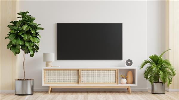 تلویزیون دیواری سفید روی کابینت در طراحی مینیمال اتاق نشیمن