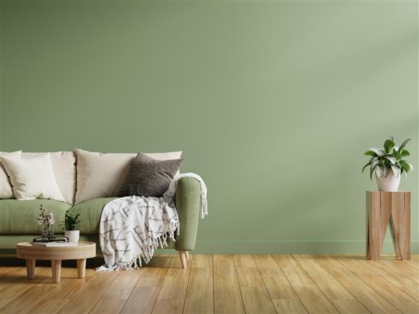 ماکت دیوار داخلی در رنگ های تیره با مبل سبز در پس زمینه دیوار سبز