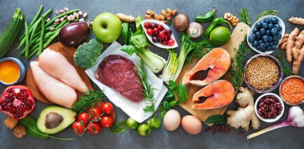پس زمینه غذای رژیمی متعادل غذای ارگانیک برای تغذیه سالم فوق غذاها گوشت ماهی حبوبات آجیل دانه ها و سبزیجات