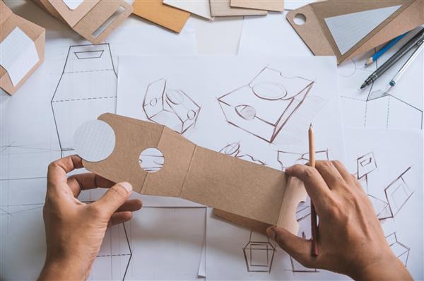 طراح طراحی طراحی طراحی طراحی طرح کاغذ مقوایی کاردستی قهوه ای محصول بسته بندی سازگار با محیط زیست جعبه ماکت توسعه قالب بسته بندی بسته برچسب برچسب مفهوم استودیو طراح 