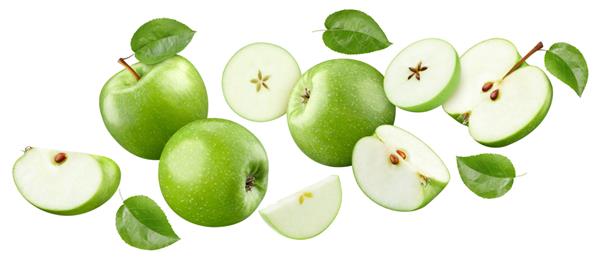 سیب سبز جدا شده در پس زمینه سفید پرواز سیب با برگ عمق میدان کامل با مسیر برش