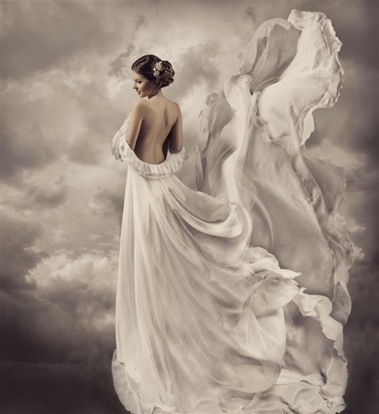 پرتره زن با لباس یکپارچهسازی با سیستمعامل لباس مجلسی دمنده سفید هنری پارچه تکان دهنده و بالنده عروس عروسی فانتزی با پشت برهنه