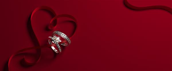 2 حلقه نامزدی طلای سفید با الماس و یک روبان قلبی شکل در زمینه قرمز پس زمینه جواهرات عروسی عاشقانه تصویر رندر سه بعدی