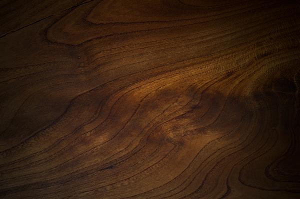 پس زمینه بافت چوب طبیعی بافت دانه دار چوب درخت بادام پس زمینه چوبی تیره