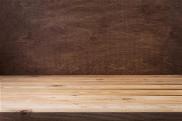 پس زمینه میز تخته چوبی به عنوان سطح بافت نمای جلو