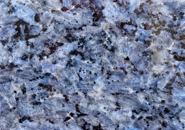 زمینه و بافت سطح سنگ تزئینی آبی زیبا کریستال های کوارتز و الگوی انتزاعی از ترک ها لکه ها و لکه ها پس زمینه طبیعی