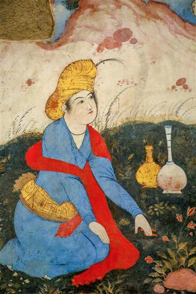 نگارگری مرد صفوی با کلاه خزدار و لباس آبی در حال چیدن گل در باغ