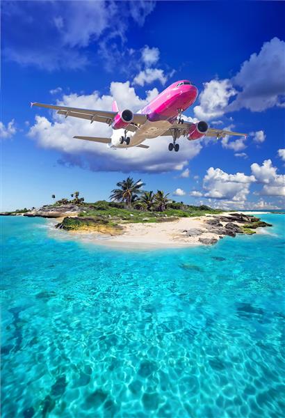 تصویر رویایی هواپیما بر فراز جزیره کیش و دریای نیلگون مناسب برای چاپ روی پرده و پوستر دیواری