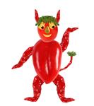 مفهوم غذای خلاقانه شیطان کوچولوی خنده دار ساخته شده از فلفل چیلی